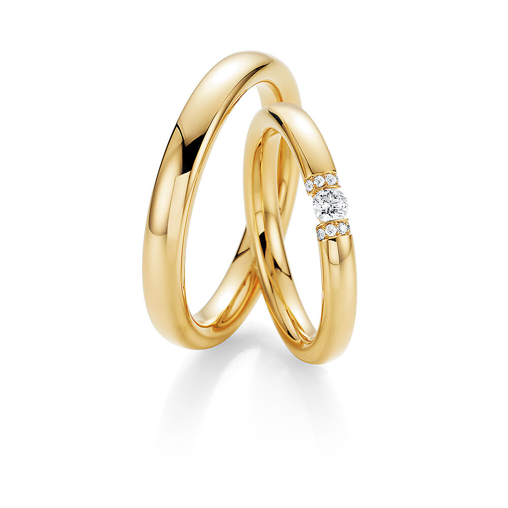 Eheringe Diamond Star in 18K Gelbgold mit Diamant 0,15ct G/SI