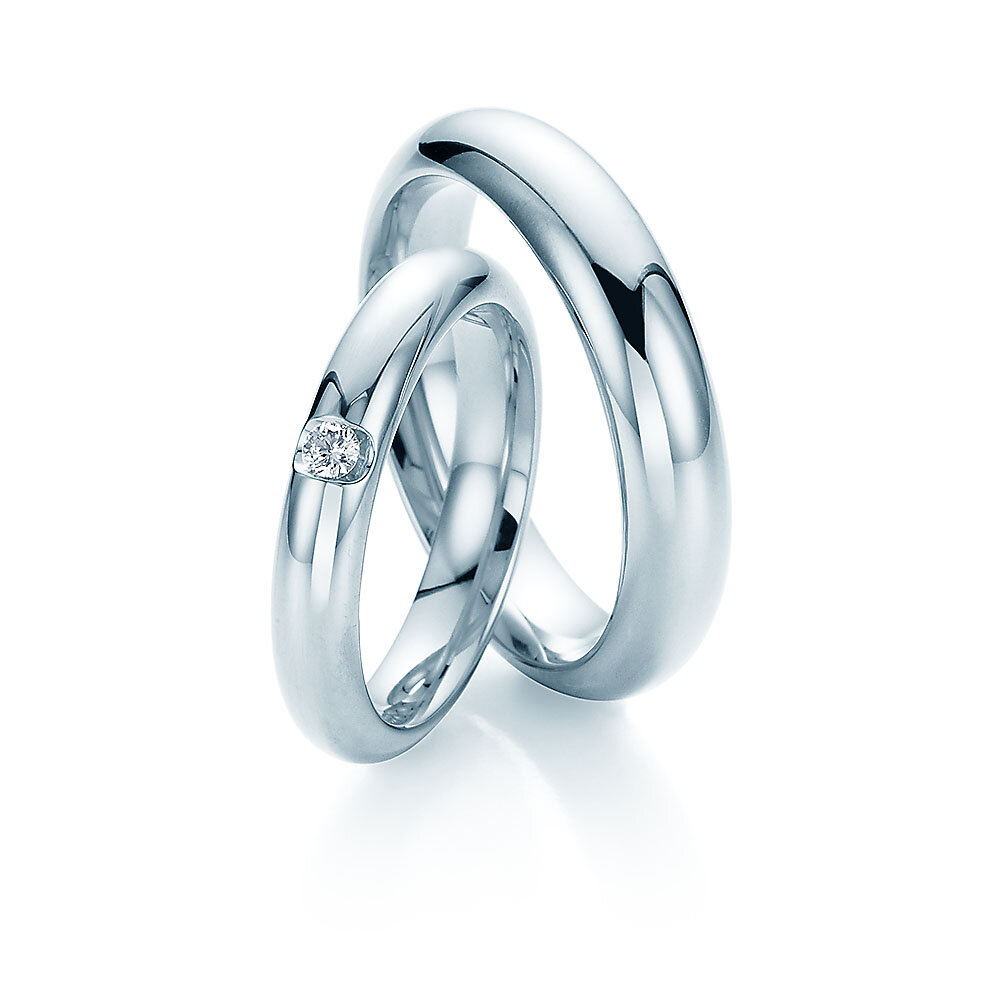 Eheringe Embrace in 18K Weißgold mit Diamant 0,05ct G/SI