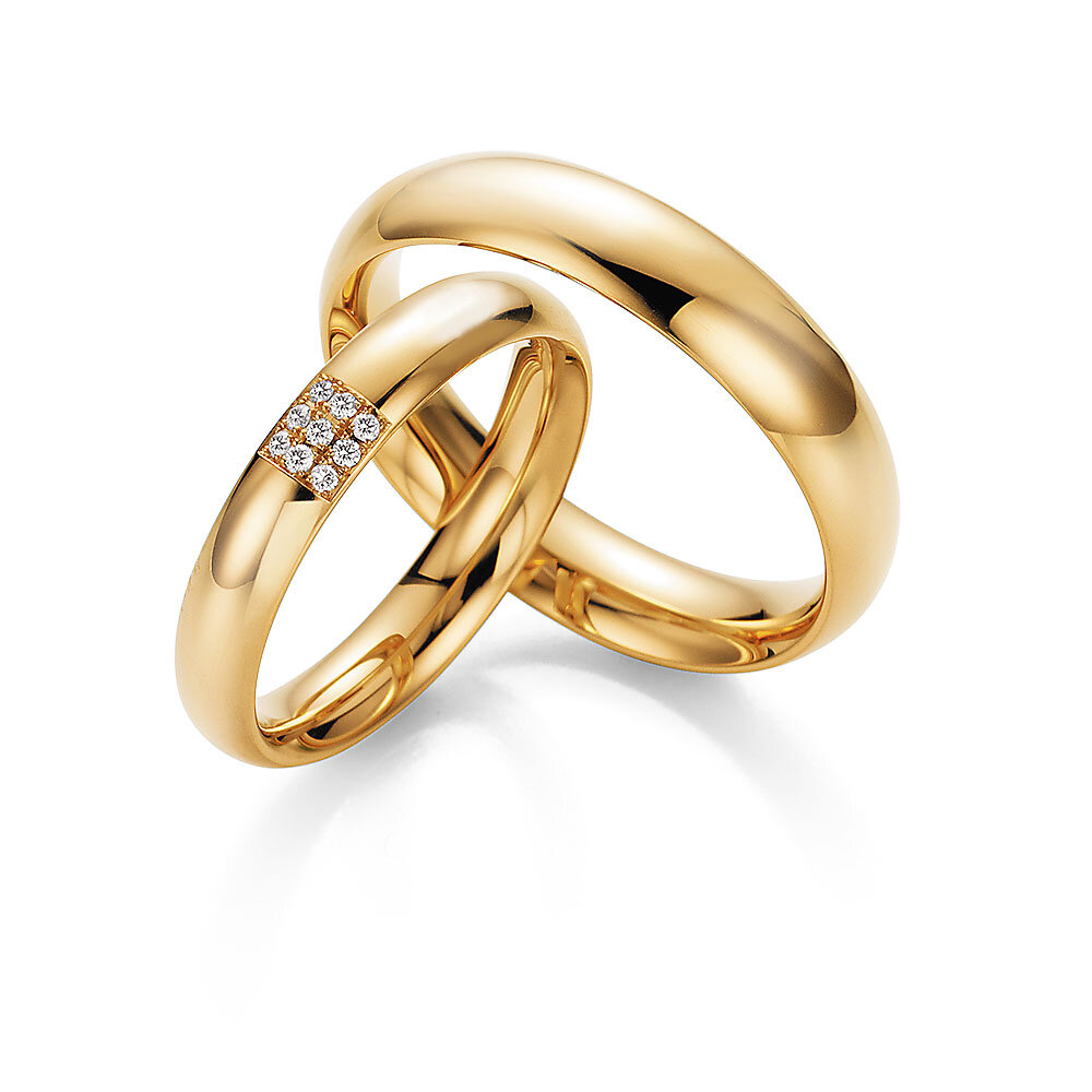 Eheringe Unity in 18K Gelbgold mit Diamanten 0,05ct G/SI